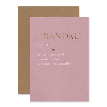 Hallmark Mother's Day Card - Grandma, pink with gold foil highlights, featuring a dictionary definition of Grandma, flat lay.