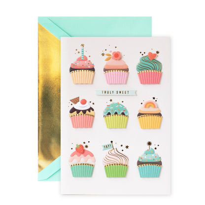 Hallmark Signature Birthday Card - Truly Sweet featuring colourful cupcake illustrations, embossed details and a gold foil interior.