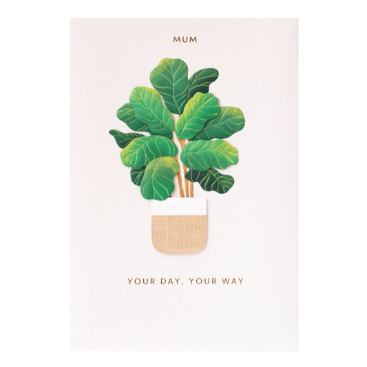 Hallmark Signature Birthday Card For Mum - Your Day, Your Way featuring a fiddle leaf fig illustration, gold foil highlights and embossed elements.