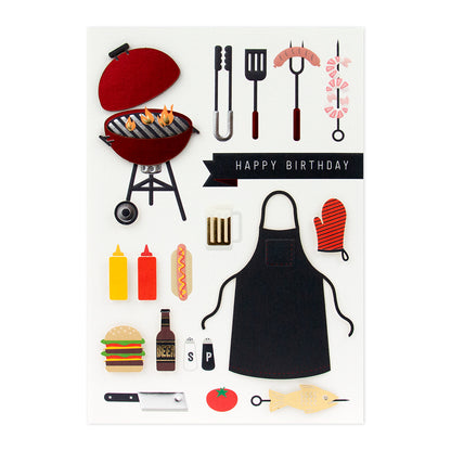 Hallmark Signature Birthday Card For Dad - Smoke The Competition, featuring barbecue stickers, vibrant colours, and fun illustrations.