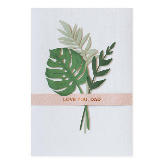 Hallmark Signature Birthday Card For Dad - Love You with paper cut leaves and rose gold foil details, flat lay presentation.