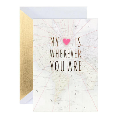 Hallmark Signature Love Card - My Heart featuring embossed map design, pink heart, and gold foil text, flat lay view.