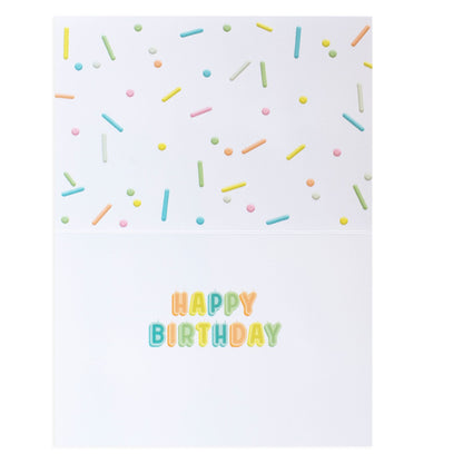 Hallmark Signature Birthday Card - YAY! featuring colourful sprinkles and the message 'HAPPY BIRTHDAY' on a white background.