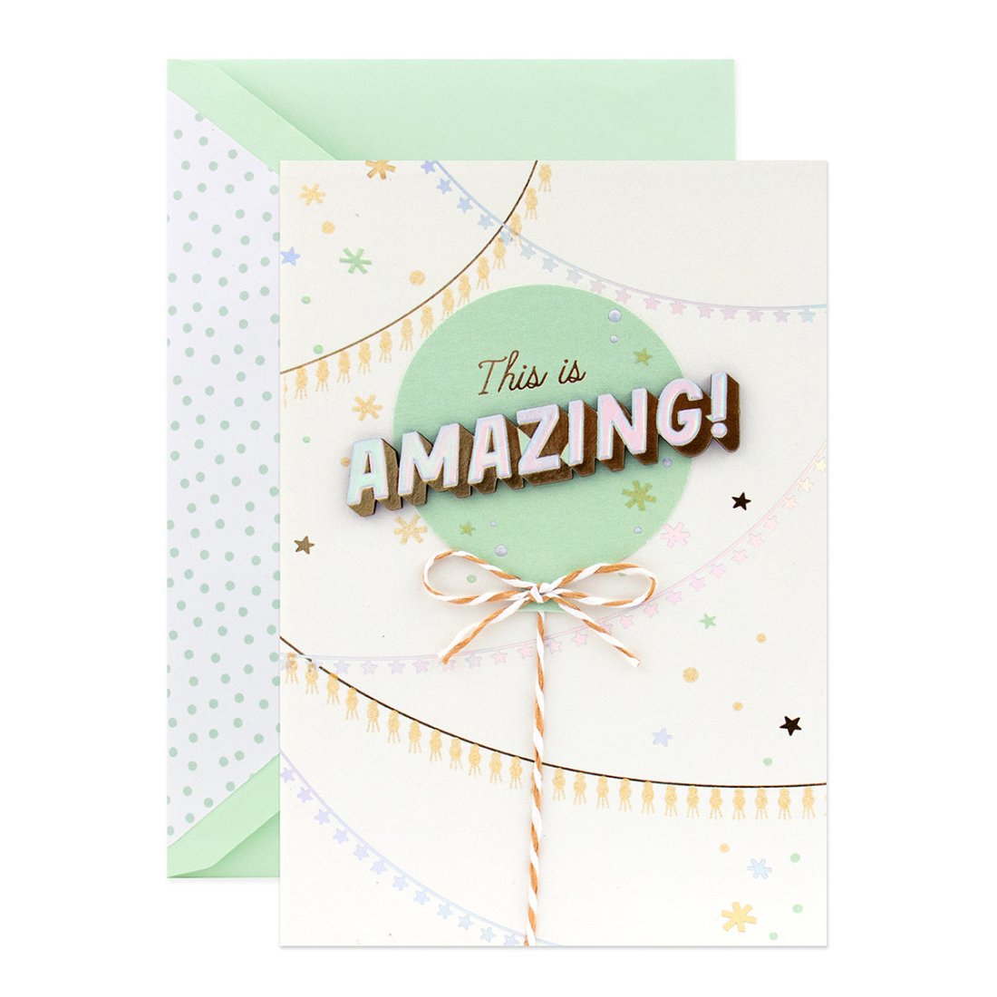 Hallmark Signature Celebration Card - This Is Amazing! featuring 3D elements and pastel colours with a green envelope in flat lay view.
