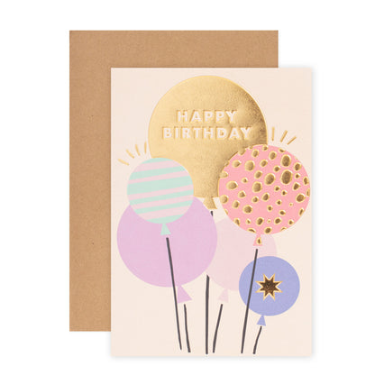 Halcyon by Hallmark Birthday Card – Balloons featuring gold foil lettering and colourful balloons, displayed with a kraft envelope.