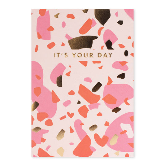 Halcyon by Hallmark All Occasion Card – It's Your Day with a colorful abstract design and gold lettering, flat lay view.
