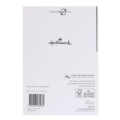 Halcyon by Hallmark birthday card – blue brushstrokes back view showing care instructions and recycling note on textured white stock.