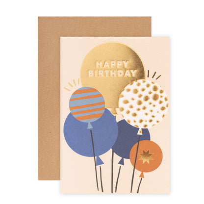 Halcyon by Hallmark birthday card – balloons featuring vibrant designs and a kraft envelope, showcasing a 'Happy Birthday' message.