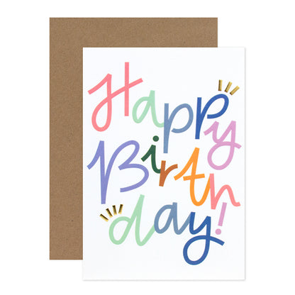 Halcyon by Hallmark birthday card – colorful typography with vibrant lettering, paired with a natural kraft envelope.