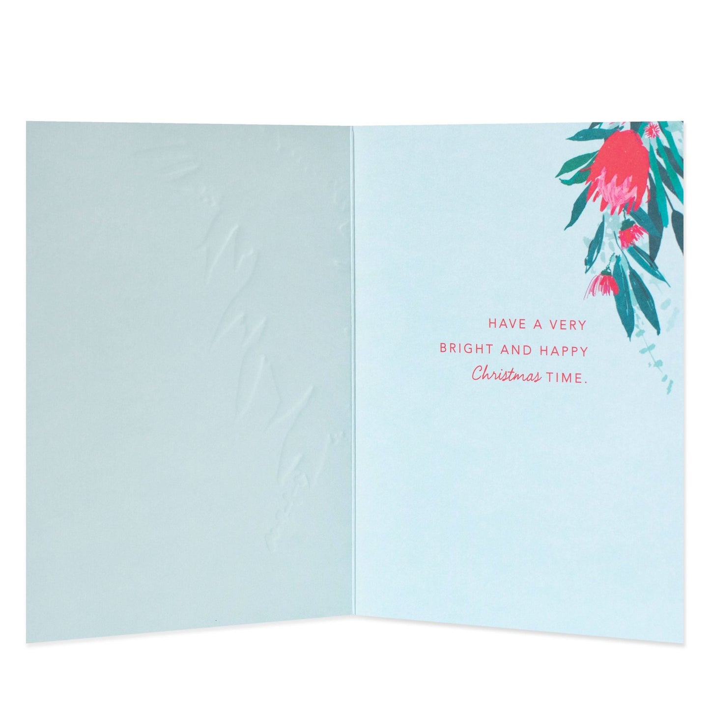 Hallmark Christmas card - Wishes From Australia, inside view featuring floral illustrations and festive message in pink text