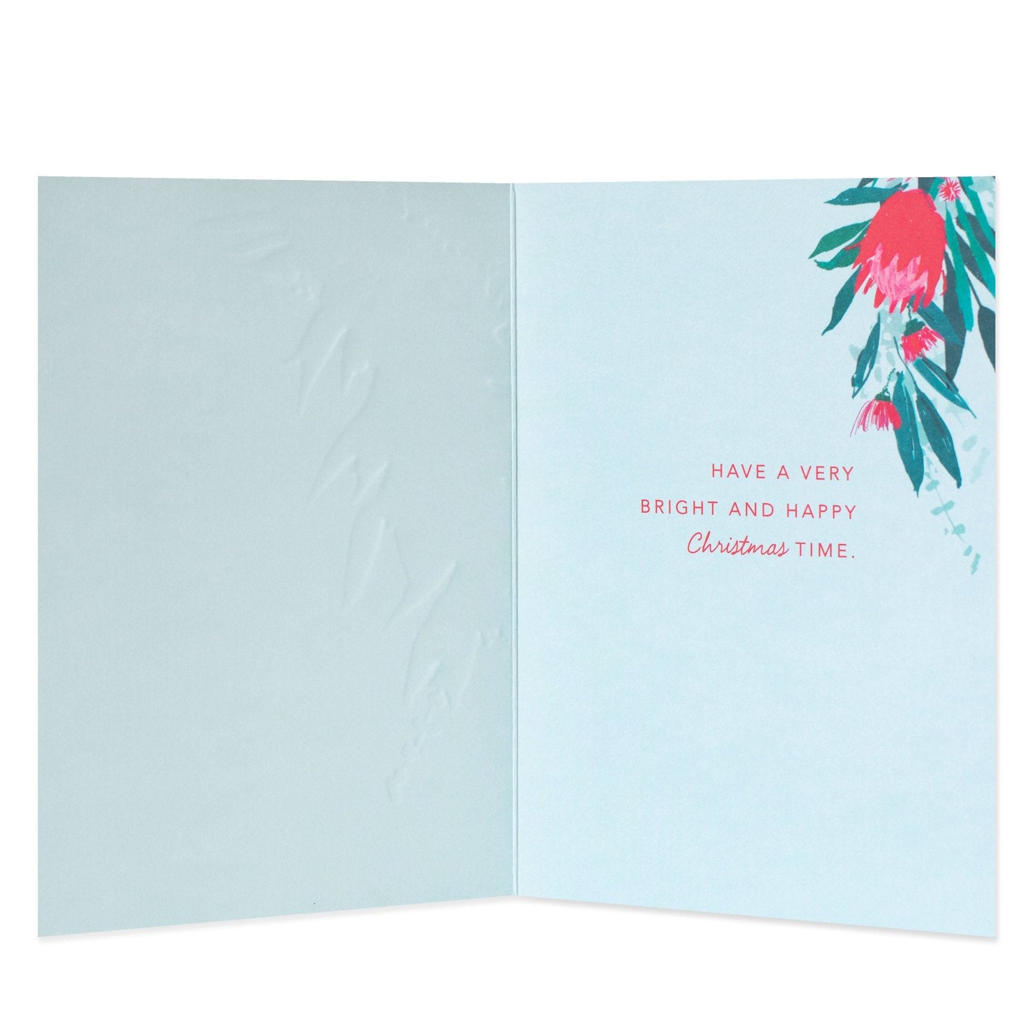 Hallmark Christmas card - Wishes From Australia, inside view featuring floral illustrations and festive message in pink text
