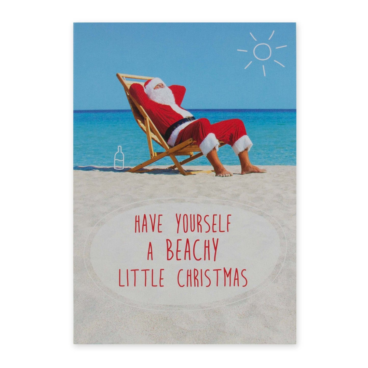 Hallmark Christmas card - Beachy Christmas featuring Santa lounging on a deck chair by the beach with festive text.