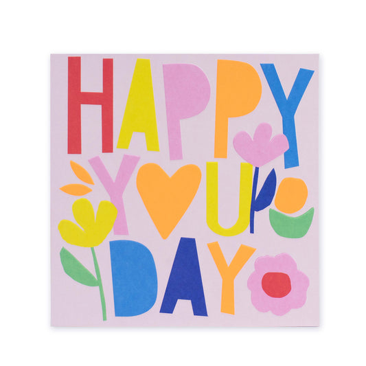 Hallmark Mother's Day Card - YOU DAY featuring bright typography and floral illustrations on a pastel background in a flat lay view.