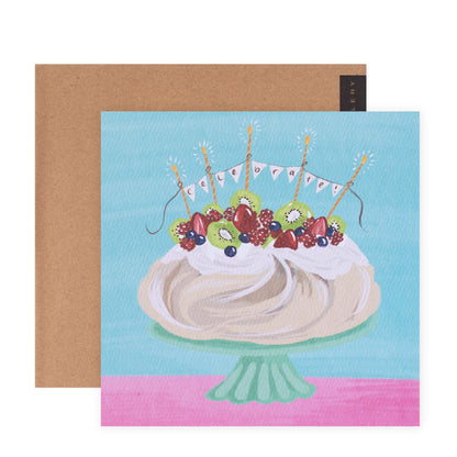 Hallmark x Christie Williams Gallery Blank Greeting Card - Celebrate Pavlova features a colourful illustration of a pavlova with mixed berries, presented in a flat lay view.