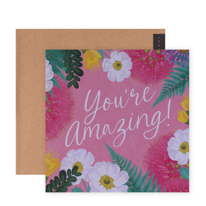 Hallmark x Christie Williams Gallery Blank Greeting Card - You're Amazing featuring vibrant flowers on pink background and kraft envelope.