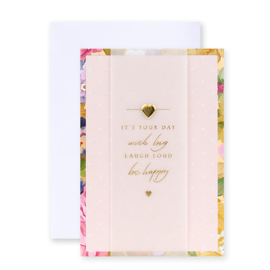 Connections from Hallmark Birthday Card - Wish Big, blush pink floral design with gold foil lettering, with white envelope, flat lay view.