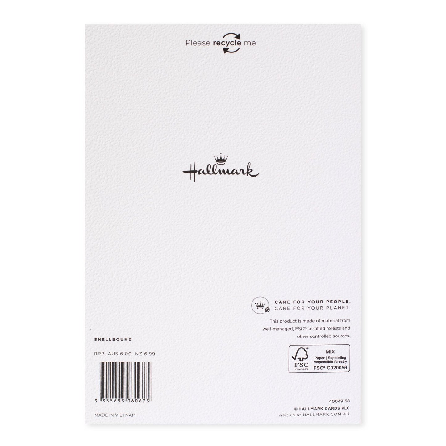 Hallmark Christmas card for granddaughter - With Love back view, featuring care instructions and logo details on textured paper.