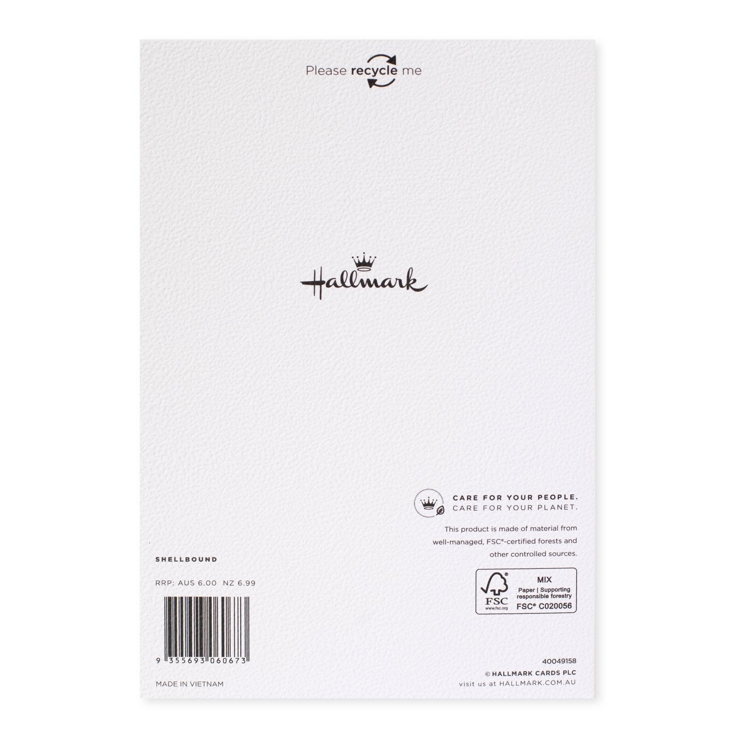 Hallmark Christmas card for granddaughter - With Love back view, featuring care instructions and logo details on textured paper.