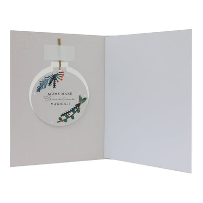 Hallmark Christmas card for Mum with detachable ornament, featuring festive illustrations and embossed details, open view.