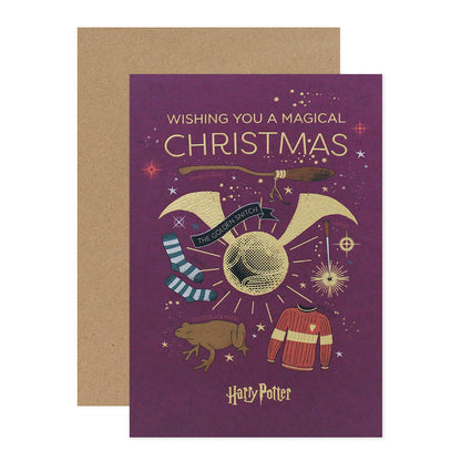 Hallmark Harry Potter Christmas Card - Magical featuring gold foil illustrations of a golden snitch, broomstick, and socks in a flat lay design.