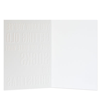 Hallmark Christmas Card - Socks, blank inside, with embossed funny message about socks, viewed open for detail