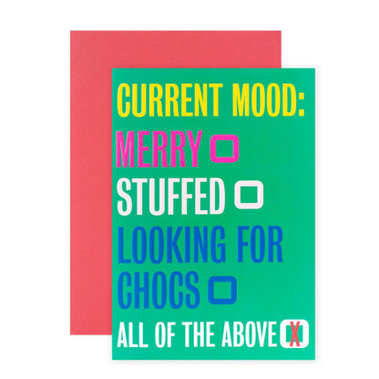 Hallmark Christmas Card - Current Mood features colourful text on green background with a red envelope, displaying humorous phrases.