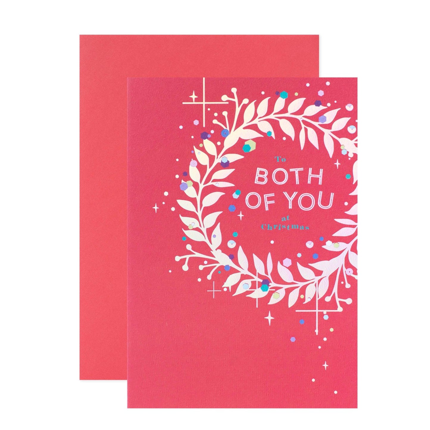 Hallmark Christmas Card For Both Of You - With Love featuring a pink front with a wreath illustration and festive accents, flat lay view.