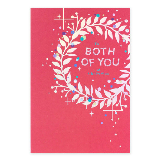 Hallmark Christmas Card For Both Of You - With Love, pink design featuring a wreath, stars, and silver highlights.