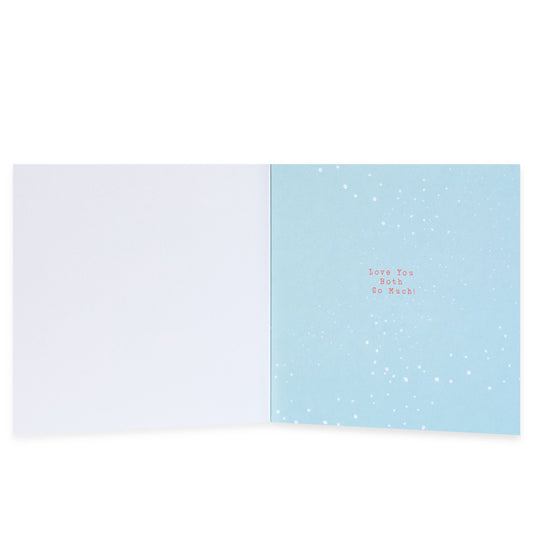 Hallmark Christmas card for Mum & Dad - Love You Both, interior view showing blue background with snowflakes and the message 'Love You Both So Much'.