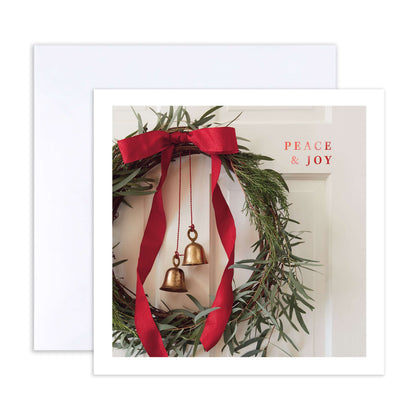 Hallmark Boxed Christmas Cards 10 Pack - Wonderful Time featuring a festive wreath with red ribbon and bells, flat lay composition.