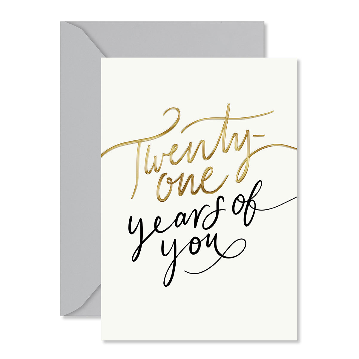 A square greeting card with an off-white front featuring metallic gold and black script that reads 'Twenty-one years of you,' shown with a light gray envelope behind it on a white background.