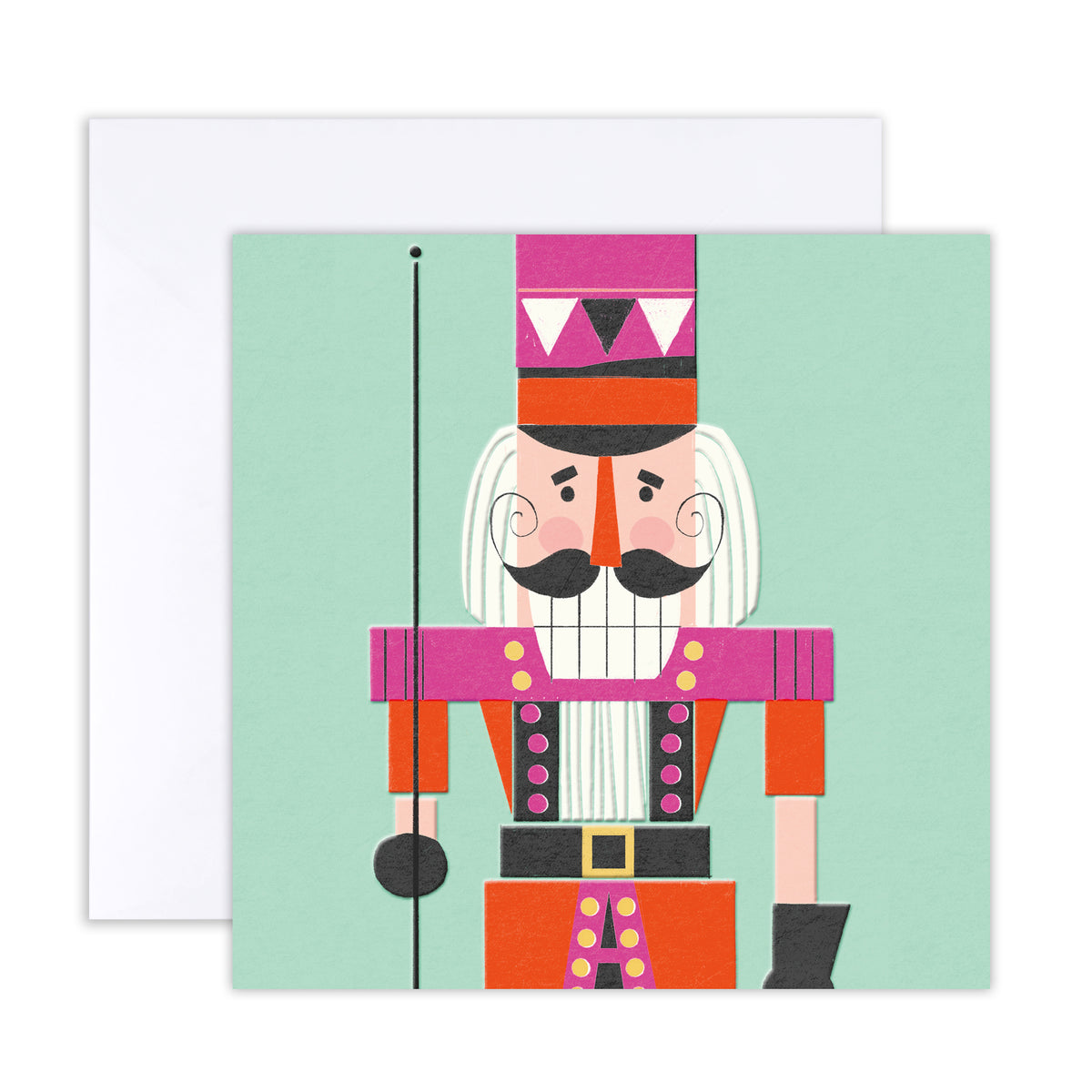 A square greeting card featuring a stylized nutcracker illustration in pink, orange, white, black, and mint green, with a white envelope behind it on a light gray background.