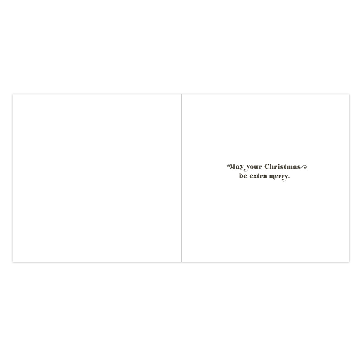 A blank greeting card shown from the back, with small black text on the right side reading, 'May your Christmas be extra merry.'.