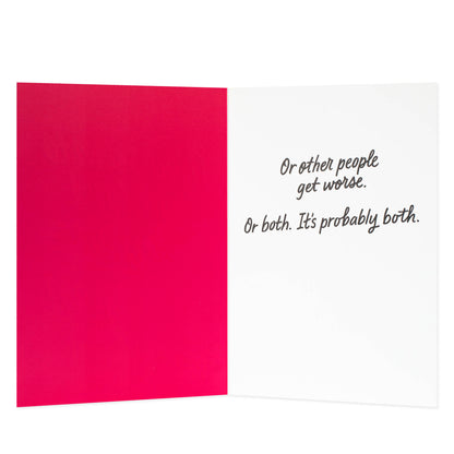 Hallmark Shoebox Birthday Card - Better Every Year, inside view featuring a bright pink and white design with humorous text.