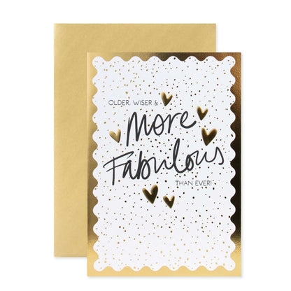 Connections from Hallmark Birthday Card - Older, Wiser & More Fabulous Than Ever, featuring gold foiled detail with hearts, flat lay presentation.