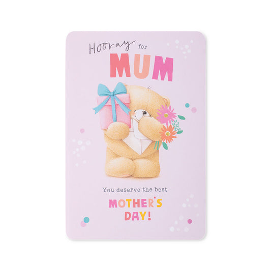Hallmark Mother's Day Card - Forever Friends featuring a cute bear holding a gift and flowers on a pink background, flat lay view.