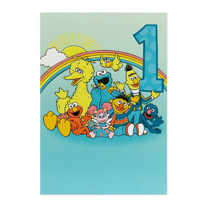 Connections from Hallmark 1st Birthday Card - Sesame Street featuring vibrant characters with number 1, flat lay on blue background.