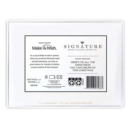 Hallmark Signature Boxed Christmas Cards 8 Pack - Gingerbread Houses, rear packaging view, featuring Make-A-Wish partnership details and inside message.