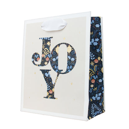 Hallmark Small Gift Bag - JOY in a stylish design featuring dark floral patterns and bold lettering, with white grosgrain handles.