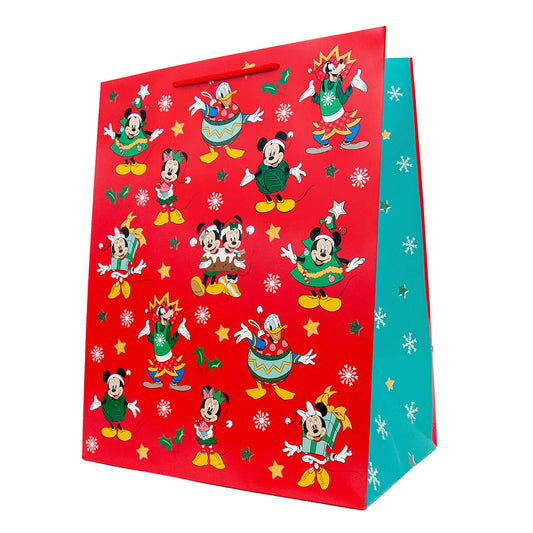 Hallmark Large Disney Christmas Gift Bag - Mickey Mouse & Friends, festive red design with Disney characters, featuring stars and snowflakes, angled view.