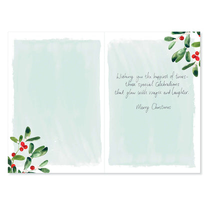 Hallmark Christmas Card For Mum & Dad - Magic & Laughter, inside design featuring green holly illustrations and heartfelt message.