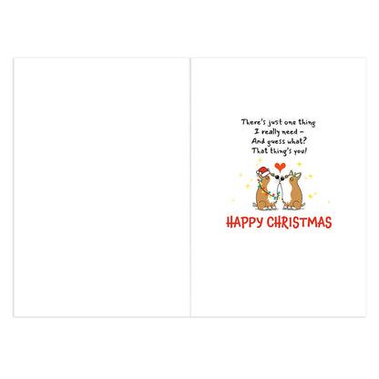Hallmark Christmas Card - Amazing Husband featuring two cartoon animals wearing Santa hats with a heartfelt message inside, flat lay view.
