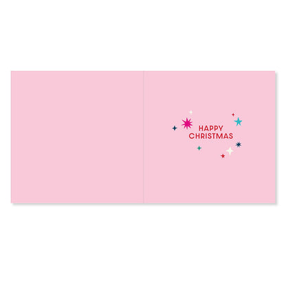 Hallmark Christmas Card For Mum & Dad - 'Tis The Season, inside view featuring pink background and colourful stars with message 'HAPPY CHRISTMAS'.