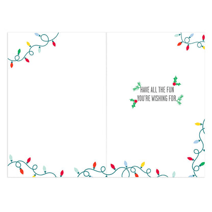 Hallmark Christmas Card - Sister & Brother-in-Law inner design featuring Christmas lights and message, flat lay view.