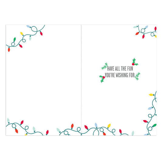 Hallmark Christmas Card - Sister & Brother-in-Law inner design featuring Christmas lights and message, flat lay view.