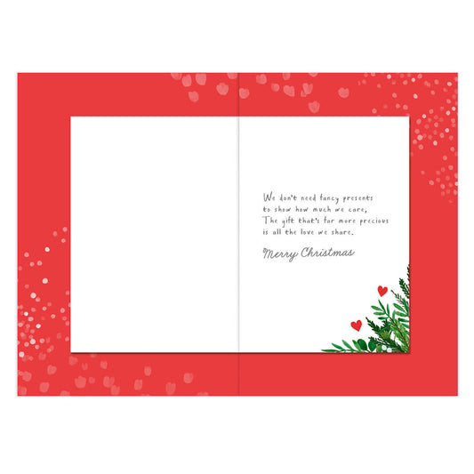 Hallmark Christmas Card - Wonderful Husband, open view with red background and festive greenery, featuring heartfelt Christmas message.