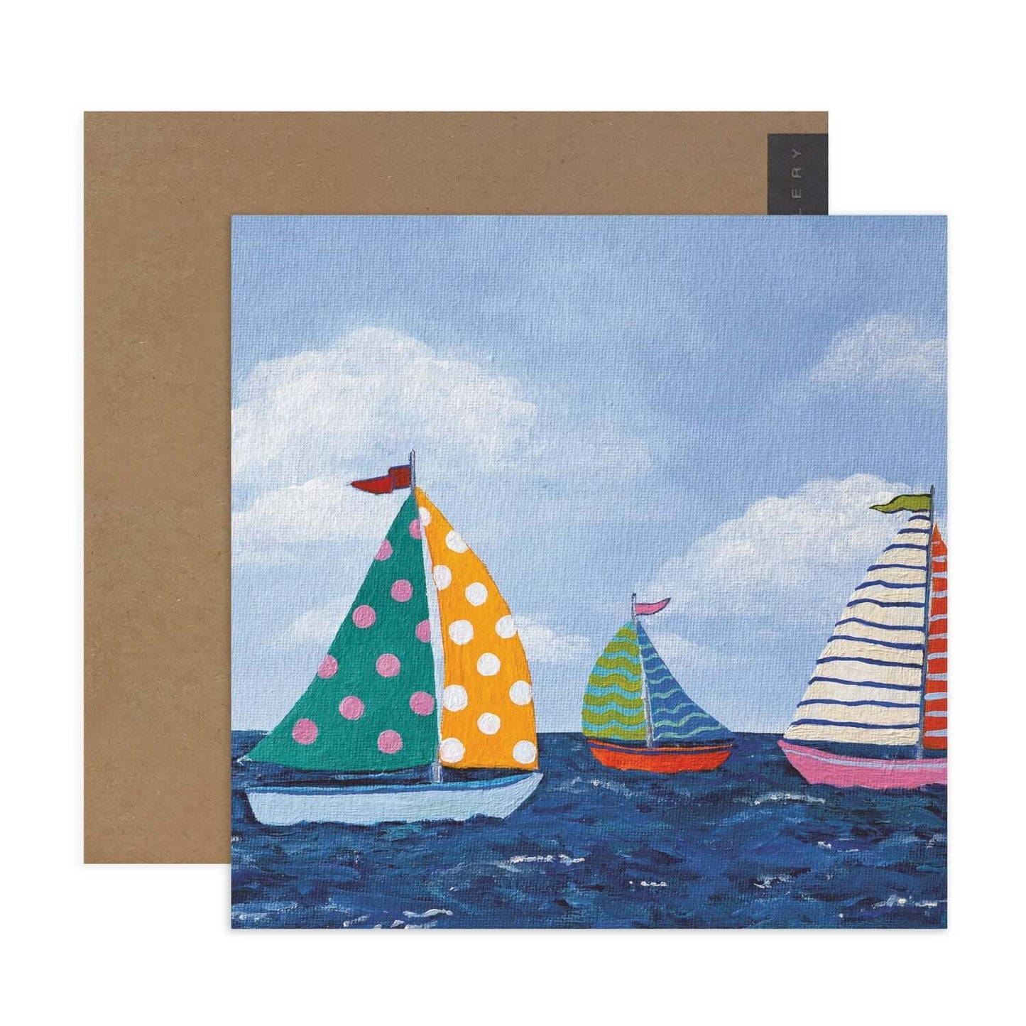 Hallmark x Kayla Henley Gallery Blank Greeting Card - A Day On The Water featuring three colourful sailing boats on blue water with a brown envelope.