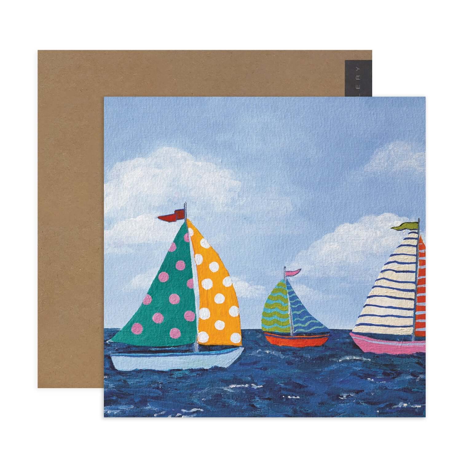 Hallmark x Kayla Henley Gallery Blank Greeting Card - A Day On The Water featuring three colourful sailing boats on blue water with a brown envelope.