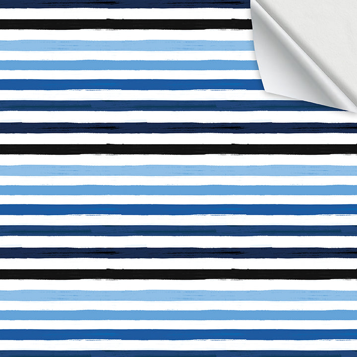 Hallmark Flat Wrapping Paper - Blue Brushstrokes with black and blue stripes on a white background, flat view showcasing design.