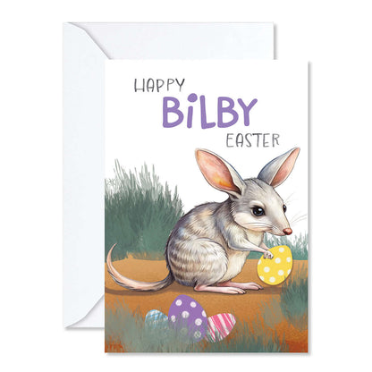 Easter greeting card with a bilby holding an egg, set against a white background.